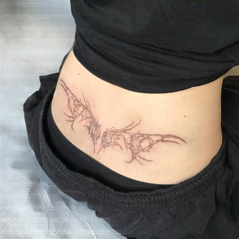 lower back tattoo designs for ladies with meaning