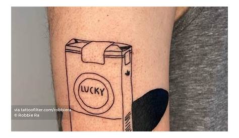 Lucky Strike cigarettes tattoo hand poked on the upper