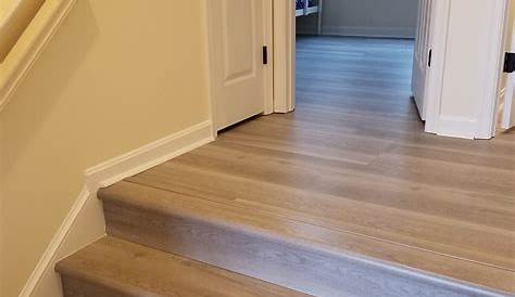 Luxury Vinyl Plank on Stairs with White Risers. House