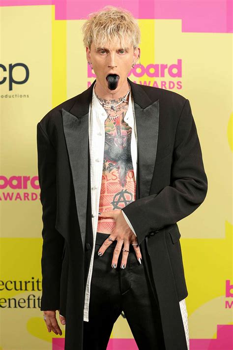 Rapper Machine Gun Kelly attends the 2017 Billboard Music Awards at... News Photo Getty Images