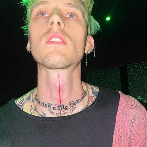 Machine Gun Kelly painted his tongue black for the Billboard Music Awards and why? PopBuzz