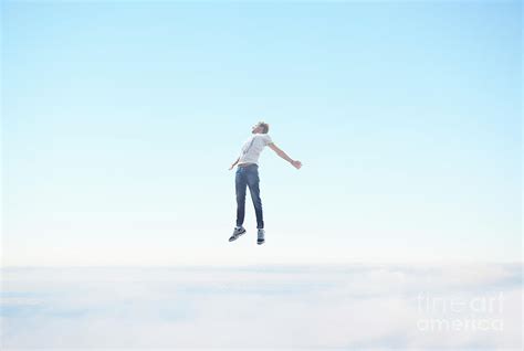 man floating in the sky