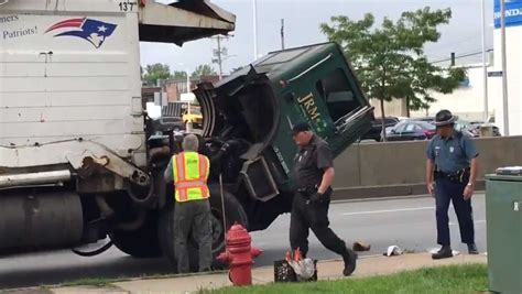 man gets hit by garbage truck