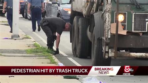 man hit by garbage truck