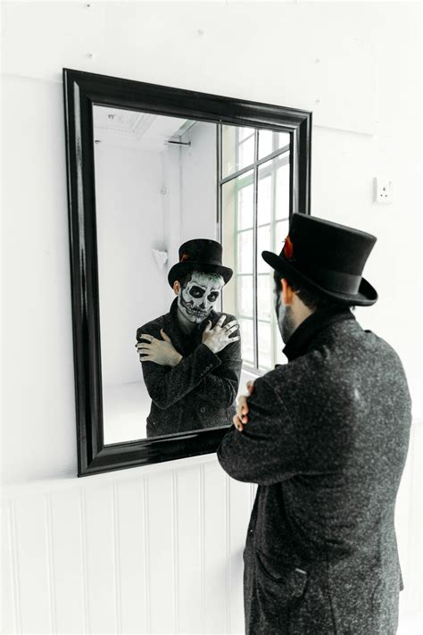 man in front of mirror