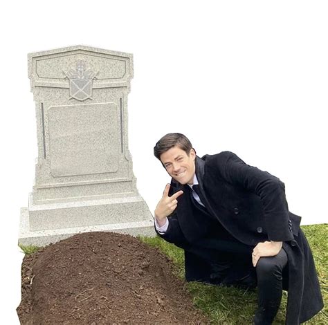 man standing over grave