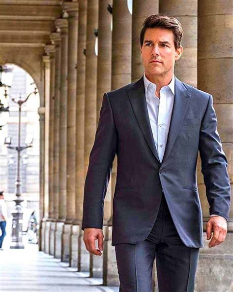 man wearing suit played by tom cruise