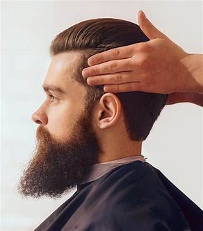 man applying pomade oil based hairstyle