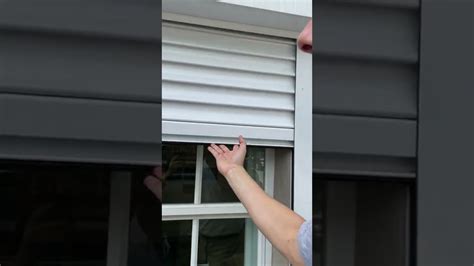 manual roll down hurricane shutters