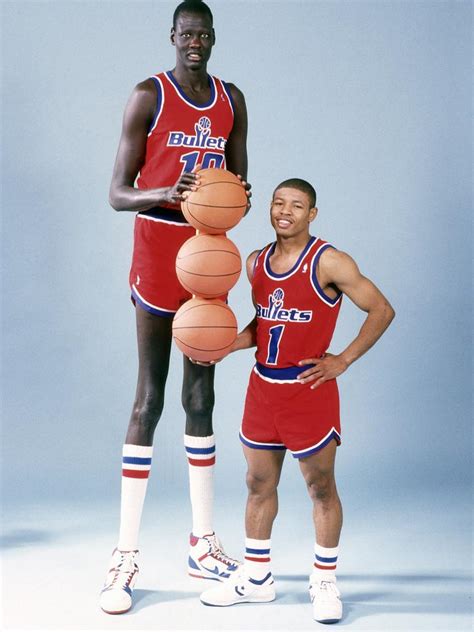 manute bol and muggsy bogues picture