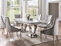 Solid marble dining table ,6 chairs plus matching marble top sideboard
