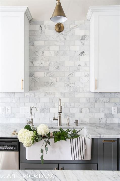marble backsplash in white kitchen