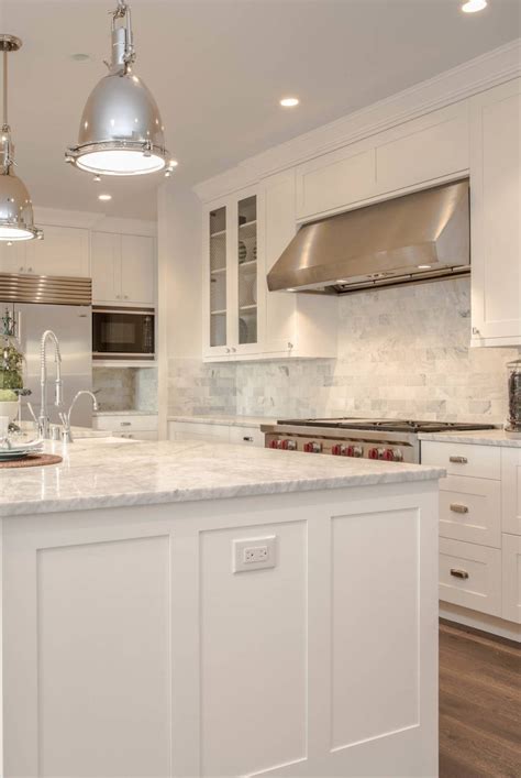 marble backsplash in white kitchen