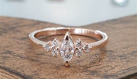 Marquise Cut Rose Gold Engagement Ring Tension Set 3 Stone In 18k