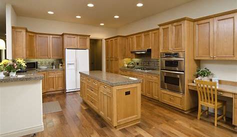 LOVE the color of the kitchen and the hardwood flooring! 