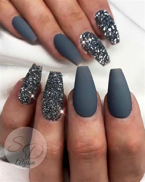 Picture Of matte grey nails with accent silver glitter nails are