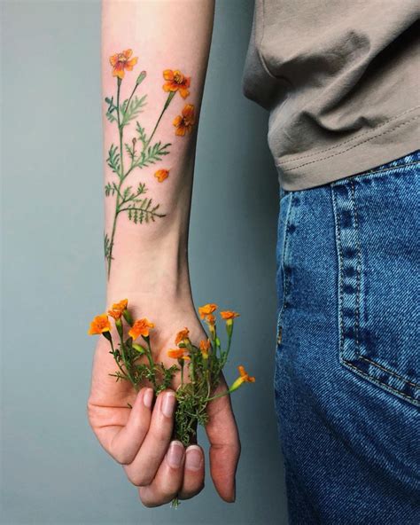 Innovative May Flower Tattoo Designs 2023