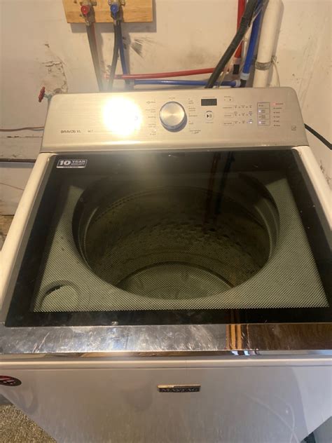 maytag washer door locked and won't open