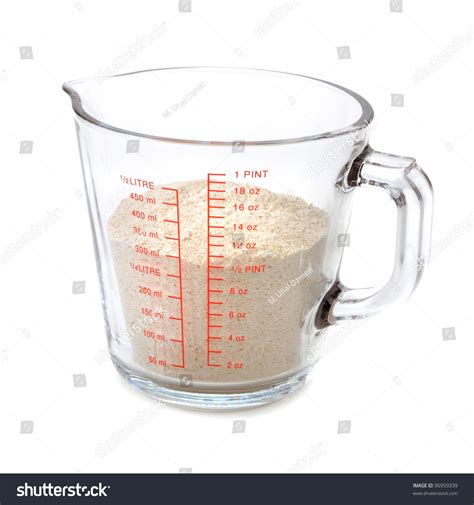 Image of a measuring cup and flour