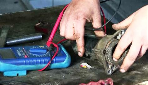 Mechanic fixing a starter
