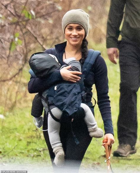 meghan markle walking dogs with baby archie