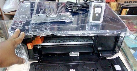 memasang cartridge printer canon e510