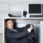 Meme Hiding Under Desk