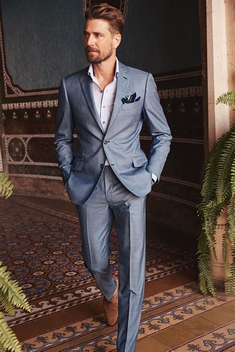 Latest peak lapel royal blue suit by Sam Boutique Wedding suits men