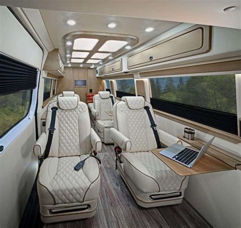 Interior of a modern Mercedes Sprinter van with advanced dashboard