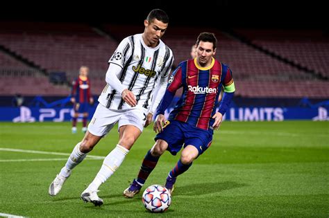messi and ronaldo playing soccer