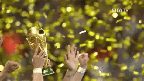 messi kissing world cup trophy gif