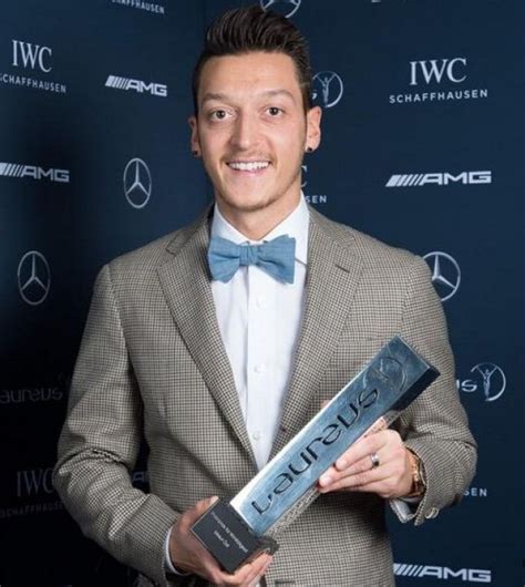 mesut ozil with his charity