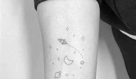 Minimalist galaxy tattoo on the ankle.