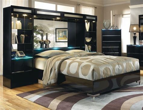 Mirrored Wall Unit Bedroom Sets
