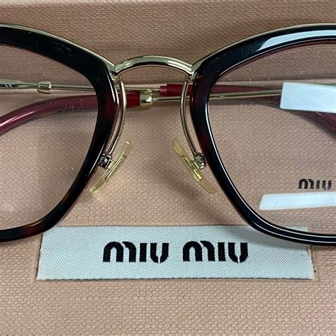 Miu Miu MU 06PV Eyeglasses