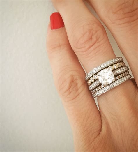 www.tassoglas.us:mixed metal engagement ring and wedding band