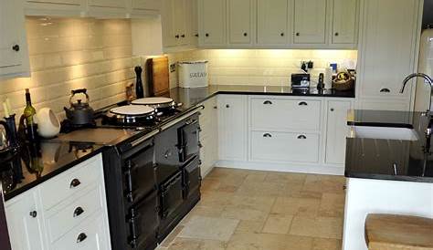 An example of modern kitchen with a travertine floor 