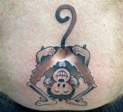 monkey belly button tattoo