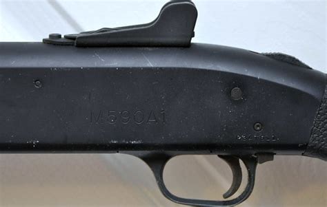 mossberg 590 serial number location