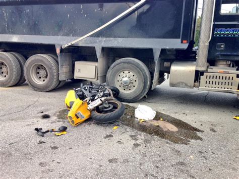 motorcycle dump truck accident