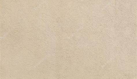 Beige Wall Stucco Texture In A Sunny Day As Background