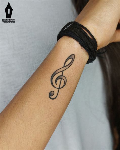 music symbol tattoo small