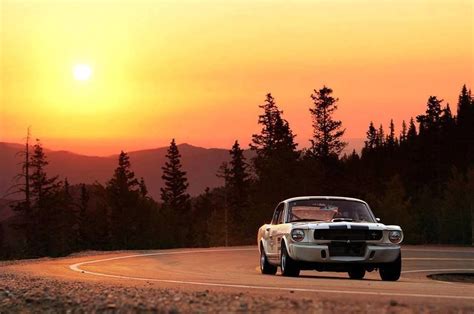 Mustang Driving into Sunset
