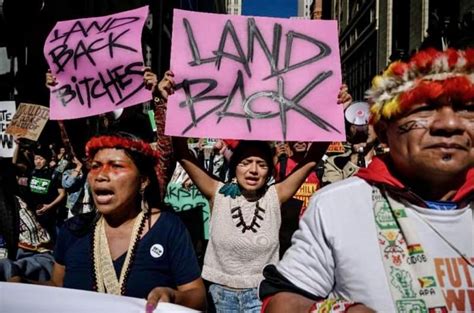 Native American woman protesting for environmental protection