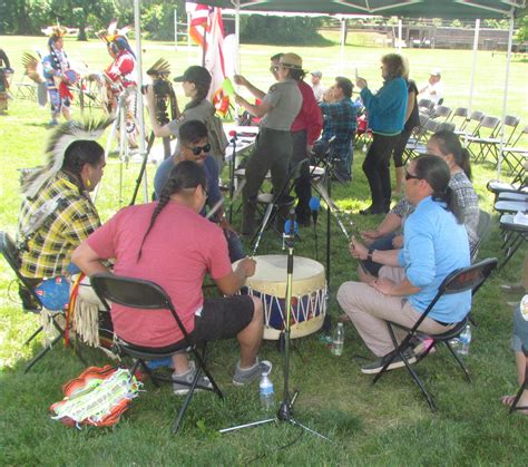 Native American youth playing drums