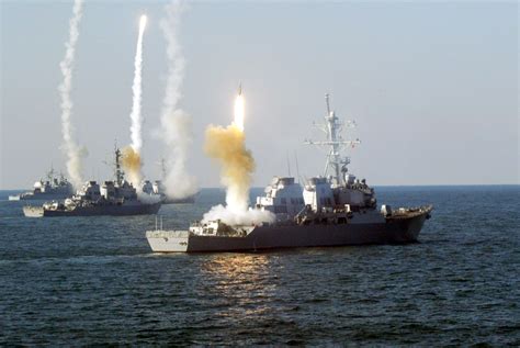navy destroyer shoots down missiles