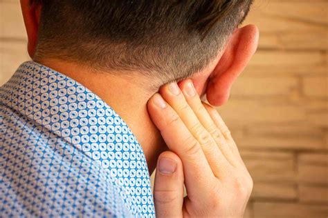 neck pain behind ear