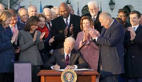 Biden signs infrastructure bill, promoting benefits for Americans