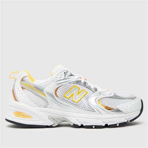 new balance 530 gold and white