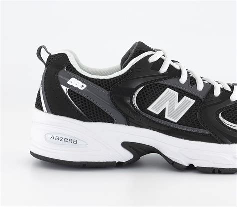 new balance 530 junior black and white